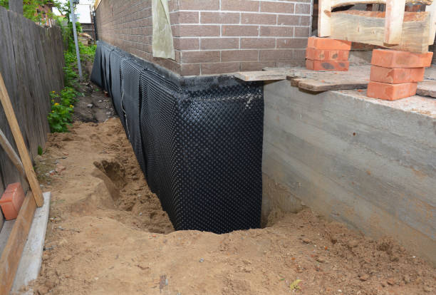SJ Waterproofing Pros technician performing targeted Interior Drainage System assessment in Monterey, TN